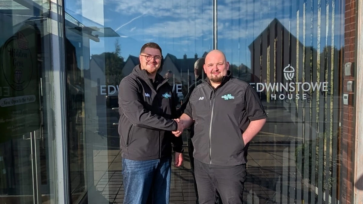 Adam Blackwell shaking hands with Mason Homer outside Edwinstowe House, RorTech Partners' office
